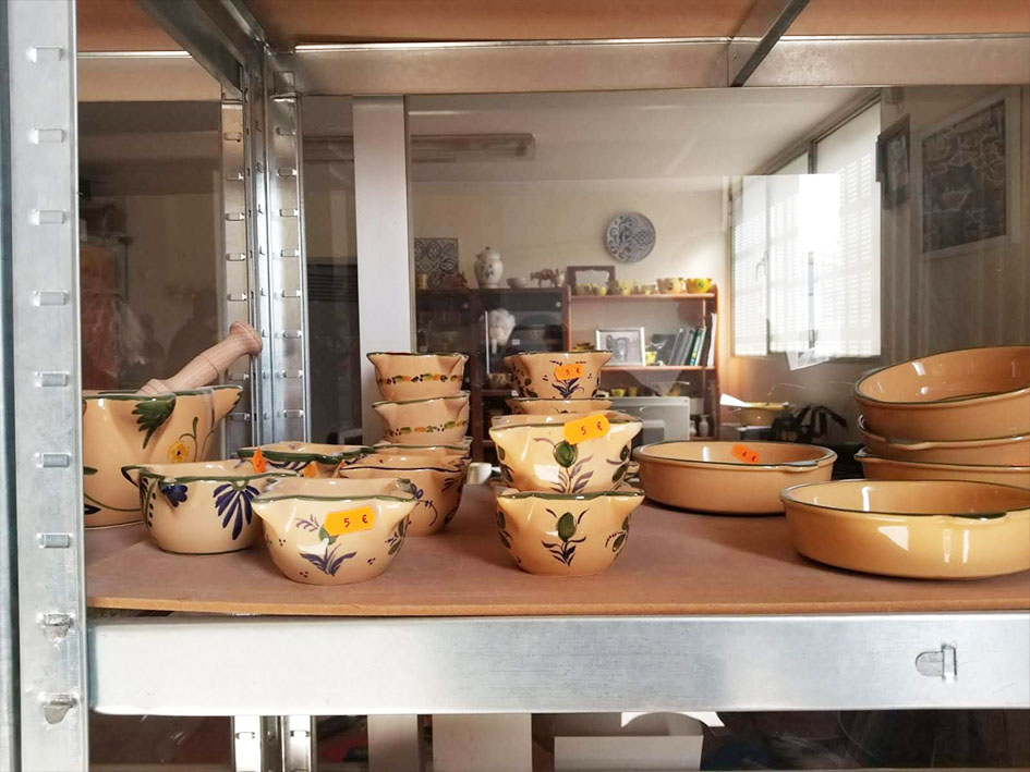 fantastic tradition of ceramic artistry in manises: display of pottery for sale
