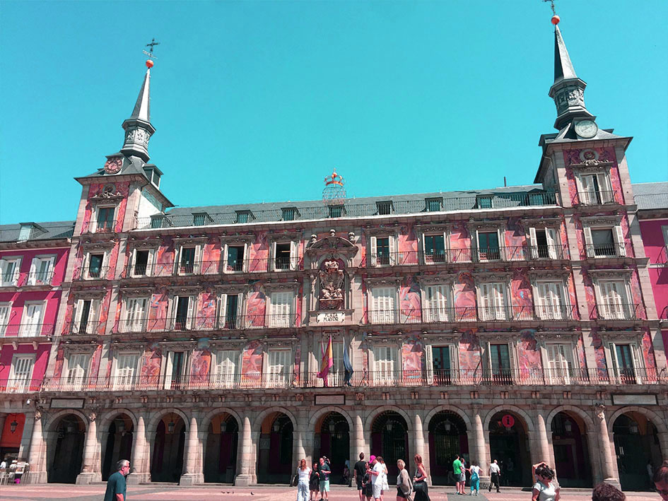 Madrid Plaza Mayor building with artwork and 2 towers. trial run a must blog post