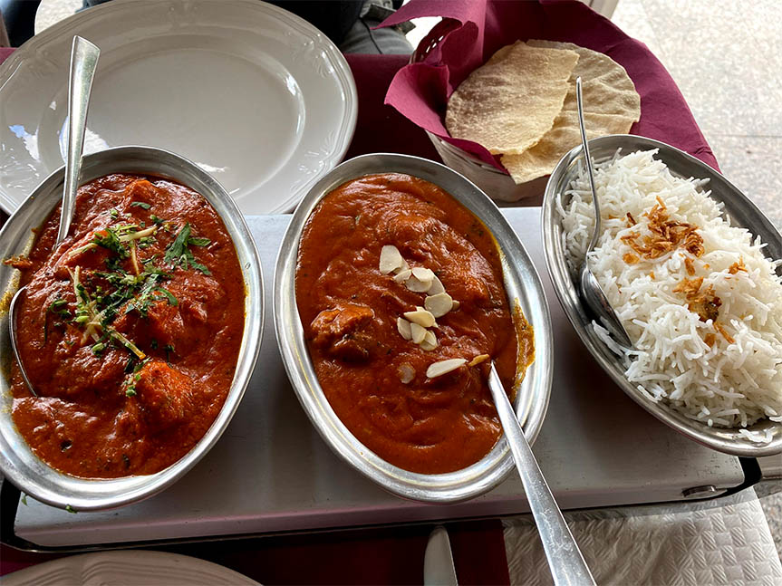 Array of Indian food with white basmati rice in the Valencia to Peniscola travel guide.