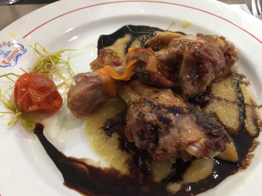 Is Valencia still a hidden gem? plate of food with pork and mashed potatoes.